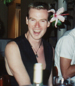 Elle with a flower growing out of his head